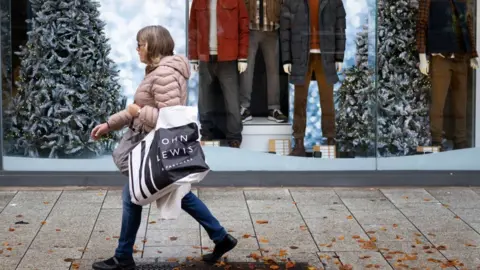 Getty Images Woman outside shop in Cardiff