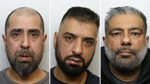 Headshots of men in their 40s and 50s. All three have beards. The one on the left has a closely shaved head, the middle man has dark hair and the one on the right has grey hair. 