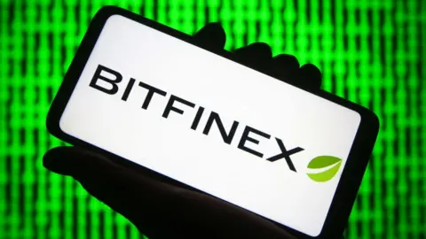 Getty Images A hacker made off with nearly 120,000 Bitcoin - now valued at about $5b - in 2016 after breaching the Bitfinex cryptocurrency exchange