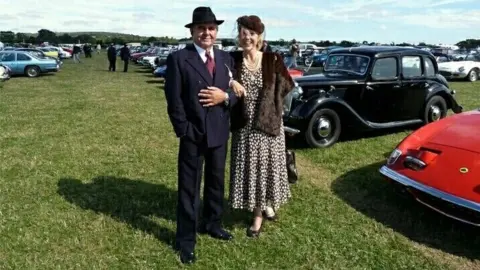 Central News David Harris and Hazel Allinson with her spaniels