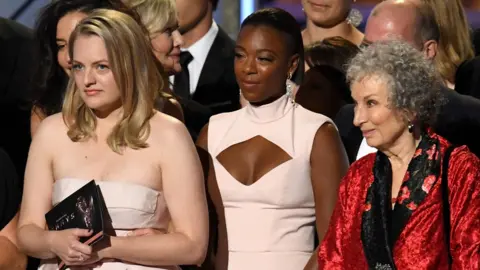 Getty Images Elisabeth Moss, Samira Wiley and author Margaret Atwood