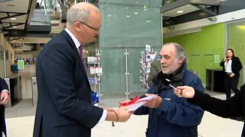 Matthew Hicks receives a petition against Sizewell C