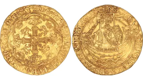 British Museum Close up of medieval gold coin showing both sides, one with a cross decoration, the other with a representation of King Henry VI in a ship, both sides have Latin inscriptions