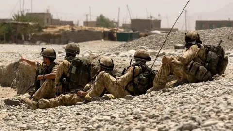 MOD Handout photo issued by the MoD of British soldiers from 3 Para and 1 Royal Irish conducting clearance patrols in and around the town of Sangin, Helmand Province, Afghanistan