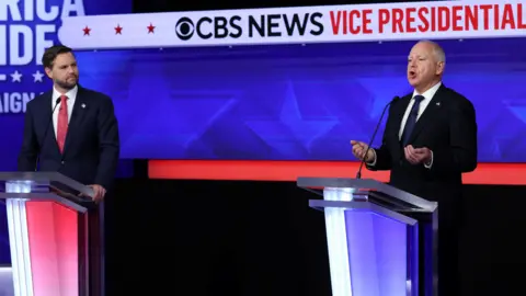 Reuters JD Vance and Tim Walz at the debate 