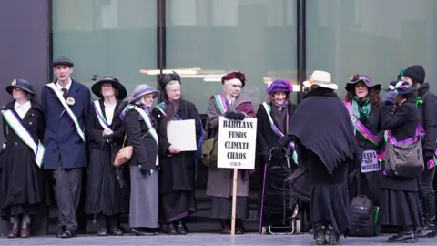 PA Media Supporters gathered outside Southwark Crown Court