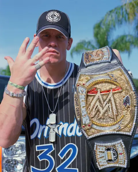Getty Images WWE superstar, John Cena at his home on August 17, 2005 in Land O' Lakes, Florida. 