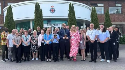 Lancashire Polce The men outside Lancashire Police offices