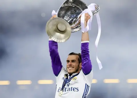 Getty Images Gareth Bale with the trophy