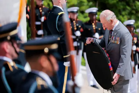 Getty Images King Charles III lays a wreath at the Tomb of the Unknown Soldier during a ceremony at Arlington National Cemetery on the final day of the state visit of King Charles III and Queen Camilla on April 30, 2026 in Arlington, Virginia. 