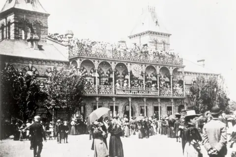 Leicester Museums & Galleries Vintage image of the pavilion at Victoria racecourse crowded with spectators