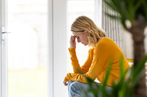 Getty Images Anonymous sad woman
