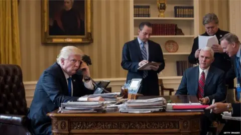 Getty Images Trump speaks to Putin by phone.