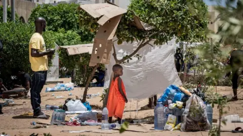 Claire Press/BBC Migrants in Sfax