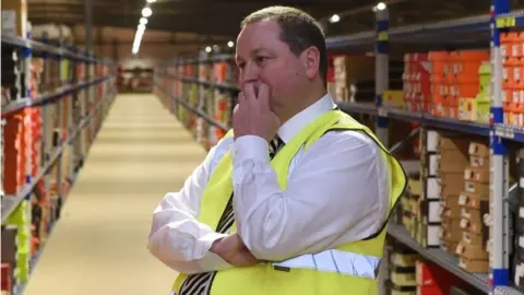 PA Mike Ashley in Sports Direct warehouse