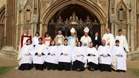 Diocese of Peterborough Group of people in religious vestments - including bishops, deans, archdeacons and ordinands