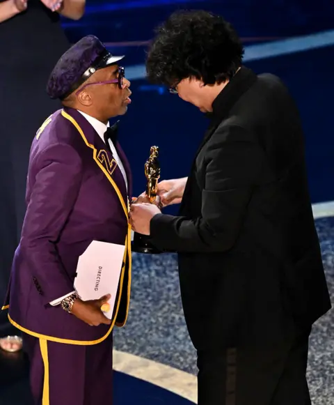 Shutterstock Spike Lee presents an Oscar to Bong Joon-ho