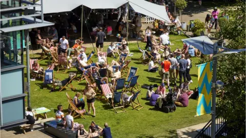 Mark Waugh People in sunshine at We Invented The Weekend on Saturday