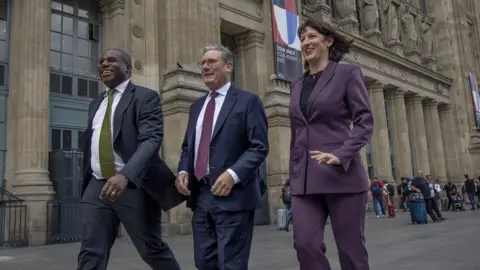 Getty Images David Lammy, Keir Starmer and Rachel Reeves in Paris
