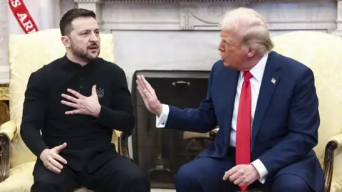 EPA-EFE/REX/Shutterstock Ukrainian President Volodymyr Zelensky (L) talks with US President Donald Trump (R) in the Oval Office of the White House in Washington, DC.
