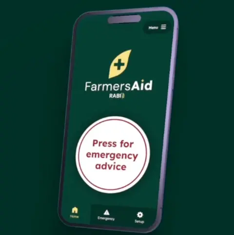 A smartphone screen displays the FarmersAid app on a dark green background, with a large central button labelled “Press for emergency advice” and a simple, uncluttered layout. The logo appears at the top with the word “FarmersAid” and “RABI”, and small icons along the bottom show options such as Home, Emergency and Setup.