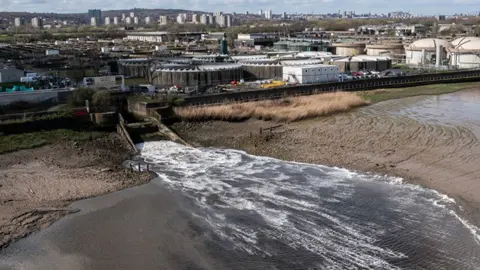 Dan Kitwood/Getty Images In this aerial view, discharge is seen flowing into the River Thames at Crossness sewage treatment works 