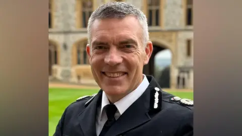 Supplied A policeman in full uniform smiling and looking into the camera.
