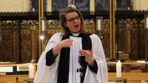The Revd Canon Cathy Nightingale using British Sign Language at Leicester Cathedral