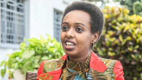 Diane Rwigara, a critic of Rwanda's President, gestures as she speaks during an interview with AFP at her home in Kigali, after her recent release on bail by the High Court, on November 2, 2018