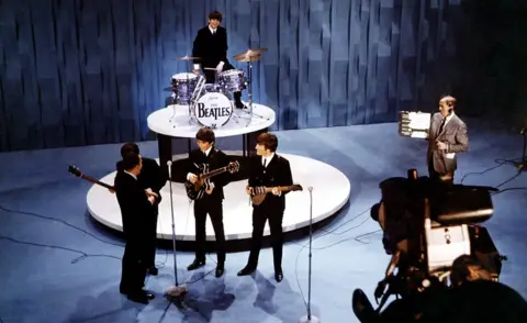Getty Images The Beatles on The Ed Sullivan Show in February 1964