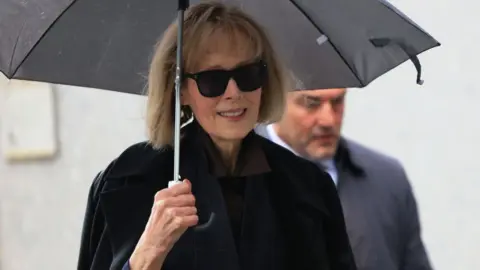 Getty Images E Jean Carroll arrives for her civil trial against former Donald Trump at Manhattan Federal Court on May 04, 2023 in New York City