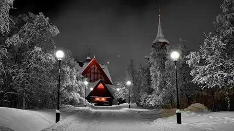 Robert Ylitalo Kiruna church at night in the snow