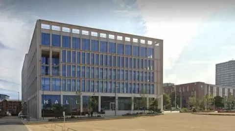 A Google Maps screenshot of Sunderland City Hall, where the coroner's court is based. The concrete building features full-height widows across the length of each floor.
