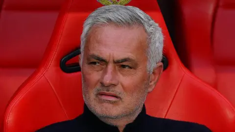 Jose Mourinho in the dugout managing Benfica