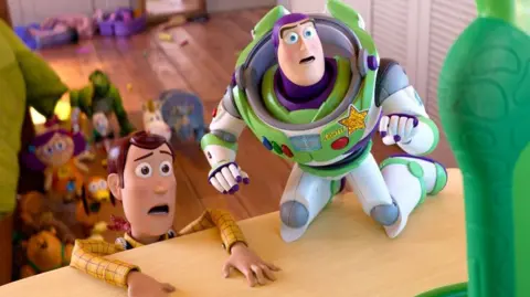 Woody and Buzz Lightyear looking scared of the digital tablet known as Lilypad