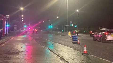 Hannah Gray / BBC Police at crash crash scene