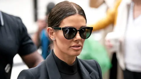 PA Media Rebekah Vardy arrives at the Royal Courts Of Justice, London, as the high-profile libel battle between Rebekah Vardy and Coleen Rooney enters its second day.