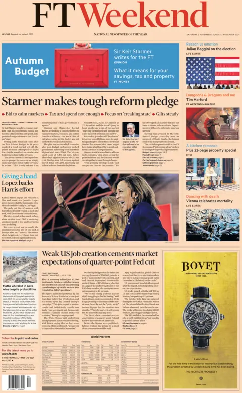 The front page of FT Weekend. A picture shows Jennifer Lopez waving, while stood next to a smiling Kamala Harris. The headline reads: 'Giving a hand. Lopez backs Harris effort'.