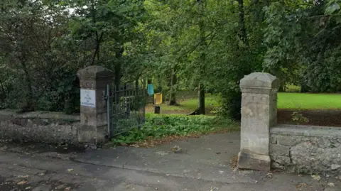 The gates to Grove Park in Weston-super-Mare, with two stone pillars