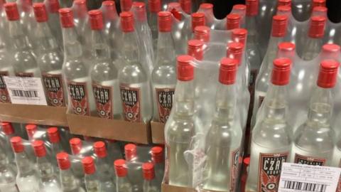 Raid on illegal Bolton alcohol distillery finds 350,000 pints of beer ...