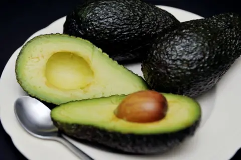 PA A file photo of avocados on a plate
