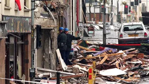 Police forensic investigators at the scene of the Omagh bombing