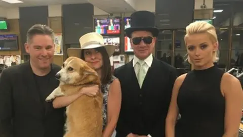 Dan Hodges, Liz Kendall, Michael Portillo and Olivia Bentley with a corgi