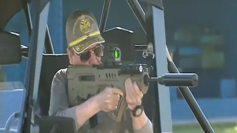 Turkmen TV Turkmen President Berdimuhamedov at shooting range, June 2019