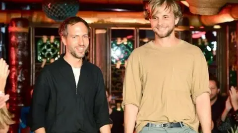 PA Peter Pilotto and Christopher de Vos on the catwalk at London Fashion Week