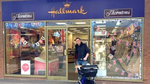 Mark Rees Mark and his son Henry in a pram