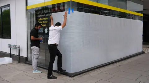 PA Shops being boarded up in North Finchley 