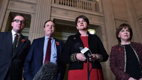 Getty Images Christopher Stalford, Nigel Dodds, Arlene Foster and Diane Dodds of the DUP