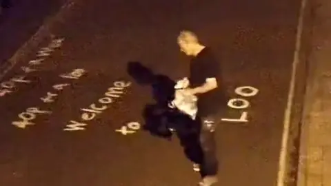 Lincolnshire Police Image of man on road