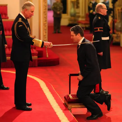 PA Media Sir Keir is knighted in 2014